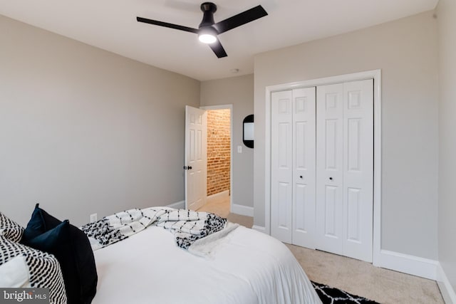3910 E Pratt St, Baltimore, MD 21224 - bedroom featuring light carpet, a closet, and a ceiling fan