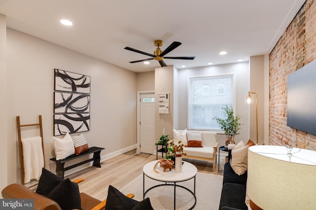 3910 E Pratt St, Baltimore, MD 21224 - living area with light wood-type flooring, brick wall, ceiling fan, and recessed lighting