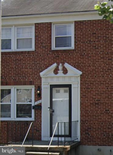 1527 Ingleside Ave, Baltimore, MD 21207 - doorway to property with brick siding