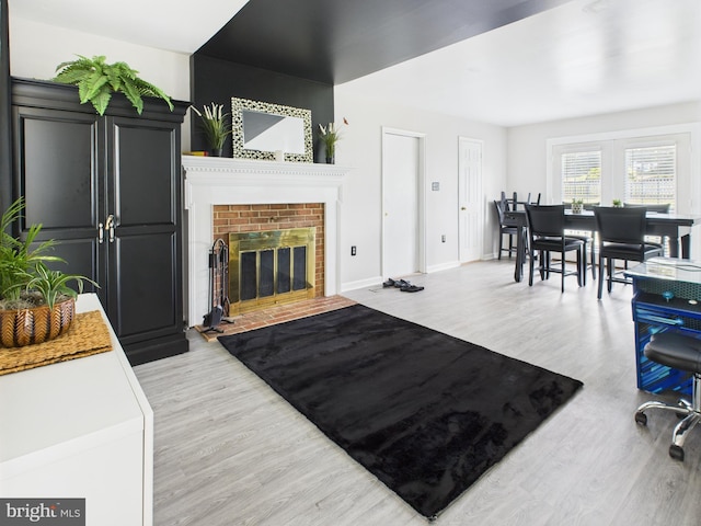 2101 Waterleaf Way, Bowie, MD 20721 - living area with light wood-type flooring and a fireplace