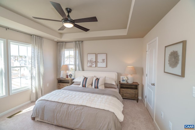 421 Willowshire Ct, Waynesboro, VA 22980 - bedroom with a tray ceiling, light colored carpet, and a ceiling fan