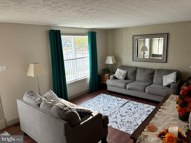 27 Dunlin Way, Sicklerville, NJ 08081 - living area featuring a textured ceiling and wood finished floors