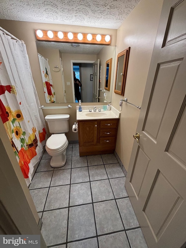 27 Dunlin Way, Sicklerville, NJ 08081 - full bathroom with a textured ceiling, vanity, and tile patterned flooring