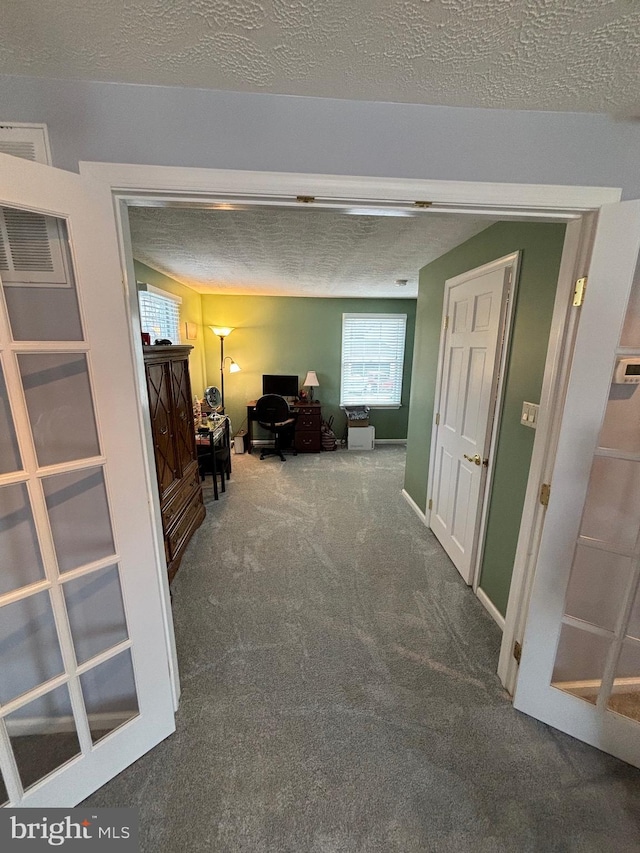 27 Dunlin Way, Sicklerville, NJ 08081 - corridor with carpet, a desk, and a textured ceiling