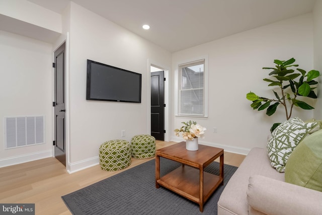 1117 Overbrook Rd, Baltimore, MD 21239 - living room with wood finished floors and recessed lighting