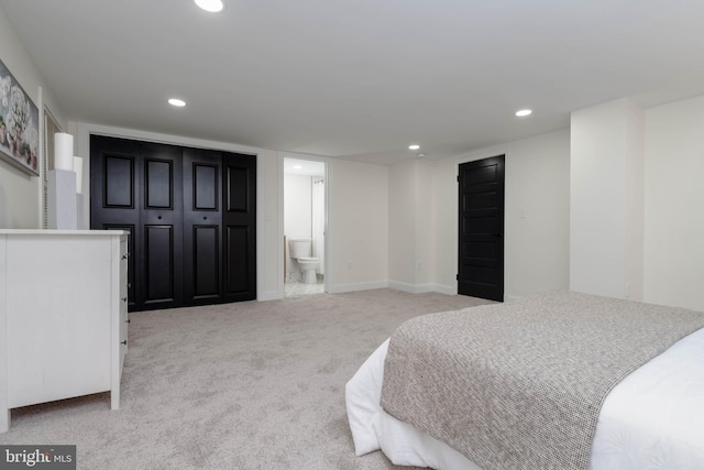1117 Overbrook Rd, Baltimore, MD 21239 - carpeted bedroom with recessed lighting and ensuite bath