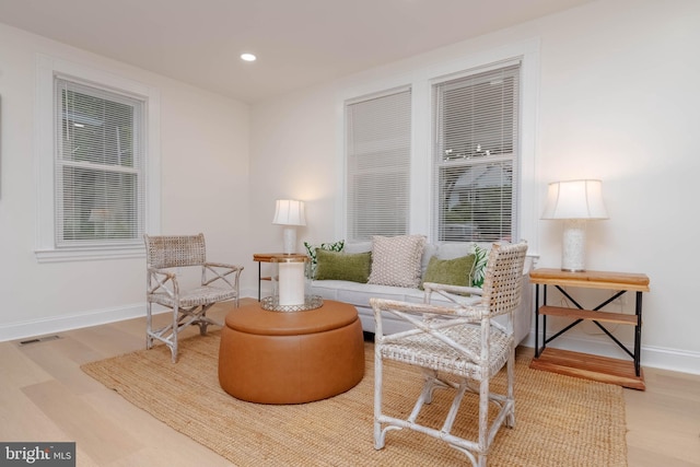 1117 Overbrook Rd, Baltimore, MD 21239 - living area with wood finished floors and recessed lighting