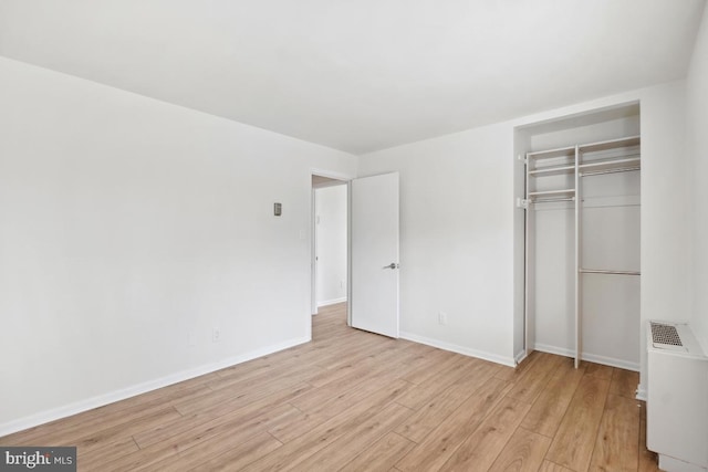 600 Roosevelt Blvd Unit 316, Falls Church, VA 22044 - unfurnished bedroom with light wood-style flooring and a closet