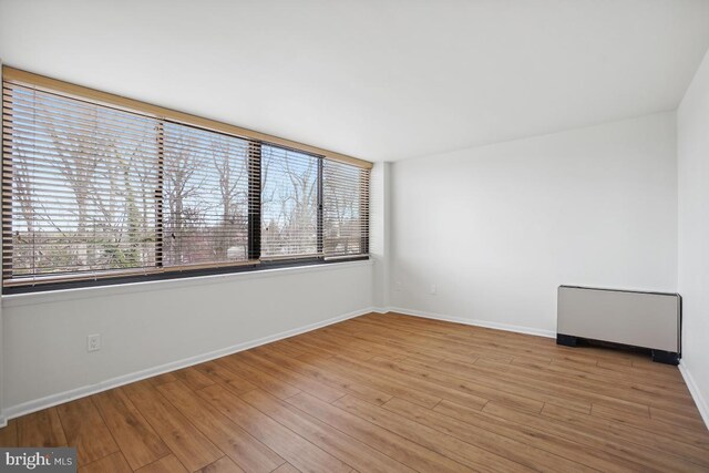 600 Roosevelt Blvd Unit 316, Falls Church, VA 22044 - unfurnished room featuring wood finished floors and healthy amount of natural light