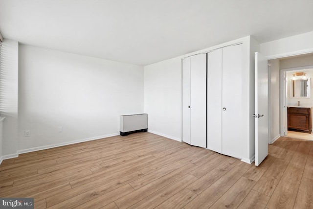 600 Roosevelt Blvd Unit 316, Falls Church, VA 22044 - unfurnished bedroom with light wood finished floors and a closet