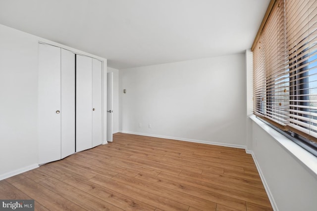 600 Roosevelt Blvd Unit 316, Falls Church, VA 22044 - unfurnished bedroom featuring light wood-type flooring and a closet