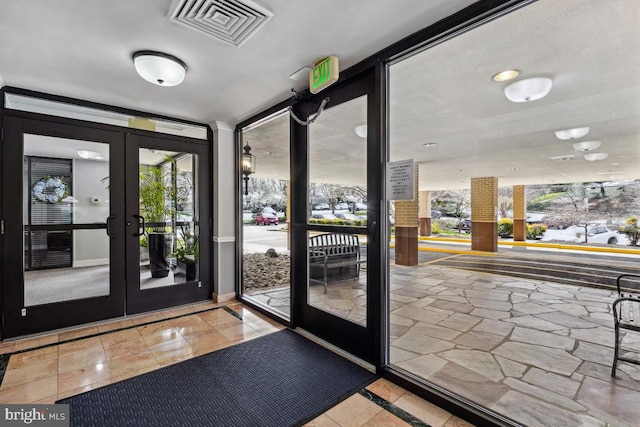 600 Roosevelt Blvd Unit 316, Falls Church, VA 22044 - doorway with french doors and baseboards