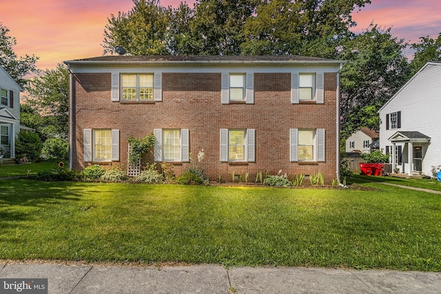 23 Berkeley, Charles Town, WV 25414 - colonial-style house with a yard and brick siding