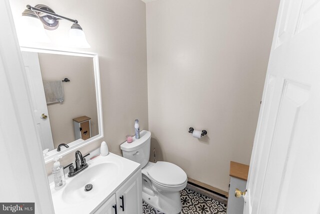 23 Berkeley, Charles Town, WV 25414 - bathroom featuring vanity and baseboard heating