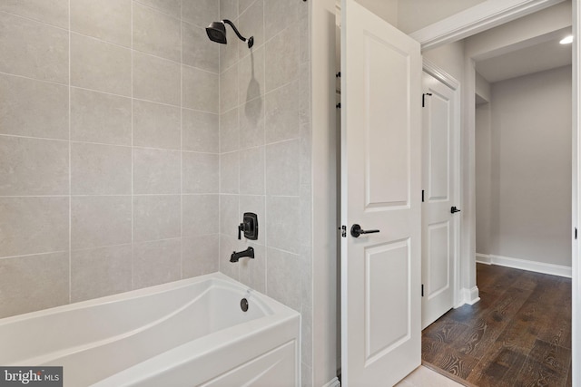 116 Grosbeak Ct, Lake Frederick, VA 22630 - bathroom featuring wood finished floors and bathtub / shower combination