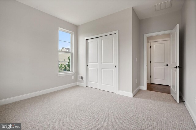 116 Grosbeak Ct, Lake Frederick, VA 22630 - unfurnished bedroom featuring carpet floors and a closet
