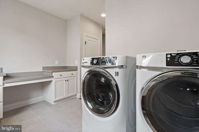116 Grosbeak Ct, Lake Frederick, VA 22630 - laundry area with separate washer and dryer, light tile patterned floors, and cabinet space