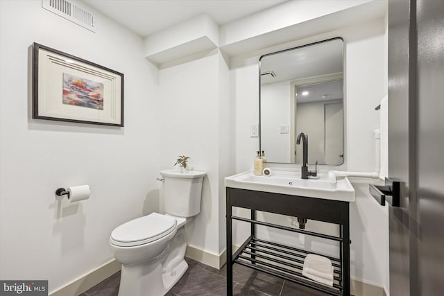 181 Levering St, Philadelphia, PA 19127 - half bathroom featuring a sink and tile patterned floors