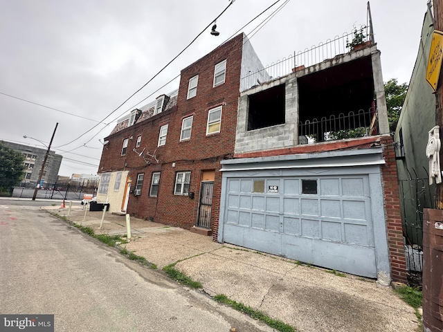 1825 S 8th St, Philadelphia, PA 19148 - view of property with an attached garage