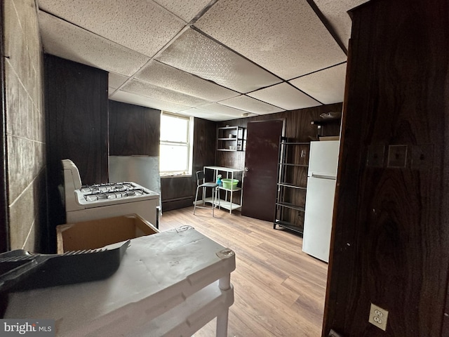 1825 S 8th St, Philadelphia, PA 19148 - misc room with light wood-style flooring, a paneled ceiling, and built in shelves