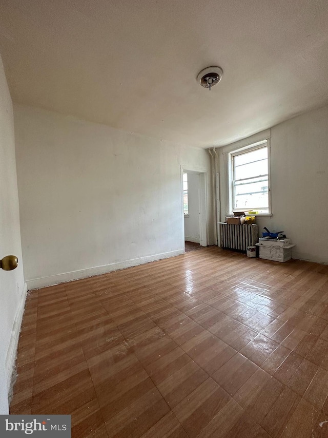 1825 S 8th St, Philadelphia, PA 19148 - unfurnished room featuring radiator and baseboards