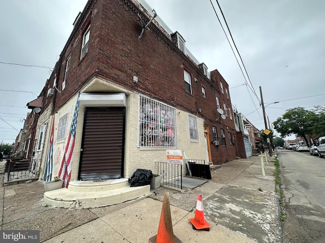 1825 S 8th St, Philadelphia, PA 19148 - view of side of property featuring brick siding