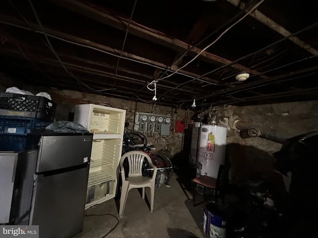 1825 S 8th St, Philadelphia, PA 19148 - unfinished basement featuring freestanding refrigerator and water heater