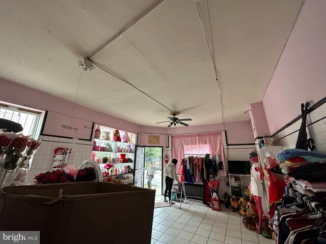 1825 S 8th St, Philadelphia, PA 19148 - living room with light tile patterned flooring and ceiling fan