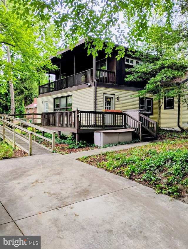 41 Spring Lake Dr, Clementon, NJ 08021 - view of front of house with a wooden deck and a balcony