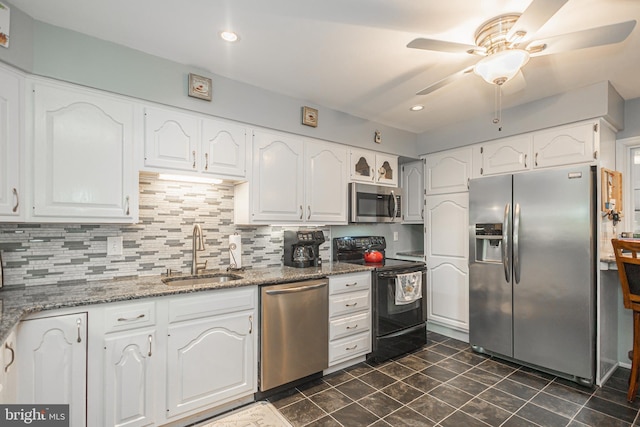 3735 Donegal Ln, Brookhaven, PA 19015 - kitchen with appliances with stainless steel finishes, a ceiling fan, white cabinetry, light stone countertops, and recessed lighting