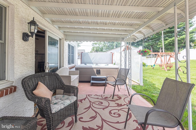3735 Donegal Ln, Brookhaven, PA 19015 - fenced backyard featuring a hot tub, a playground, and a patio area