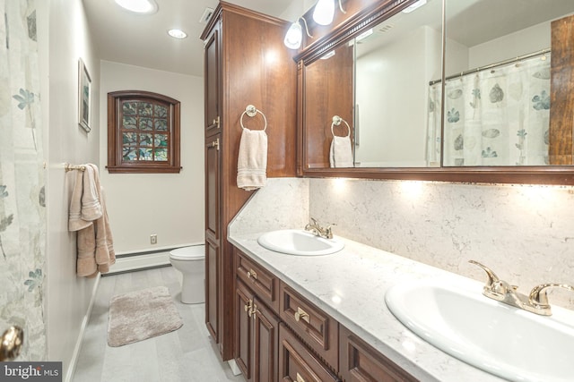 3735 Donegal Ln, Brookhaven, PA 19015 - full bathroom with a baseboard heating unit, double vanity, backsplash, and a shower with curtain