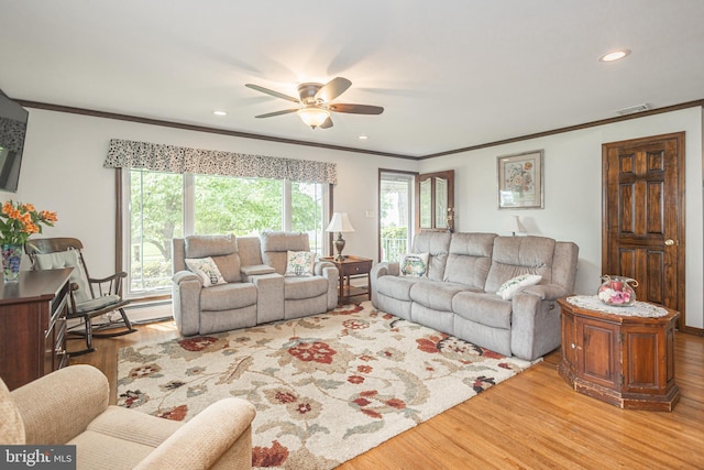 3735 Donegal Ln, Brookhaven, PA 19015 - living area with ornamental molding, wood finished floors, healthy amount of natural light, a ceiling fan, and recessed lighting