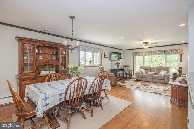 3735 Donegal Ln, Brookhaven, PA 19015 - dining space with plenty of natural light, ornamental molding, light wood finished floors, a chandelier, and recessed lighting