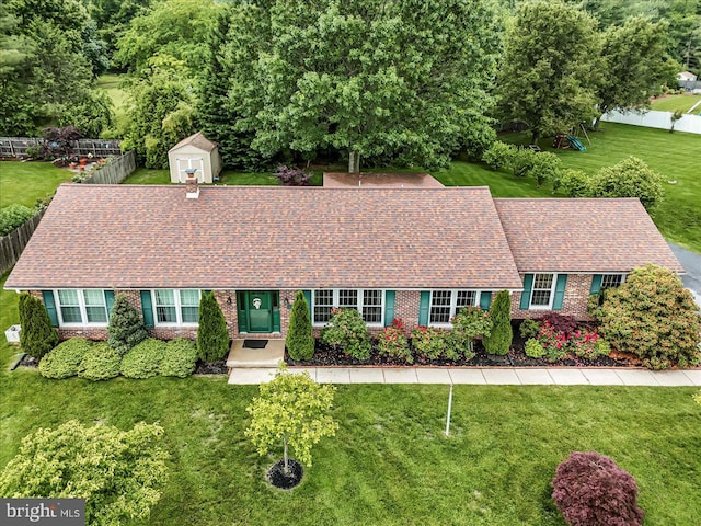 228 Benjamin Blvd, Bear, DE 19701 - view of front of home with brick siding, a shed, and a shingled roof