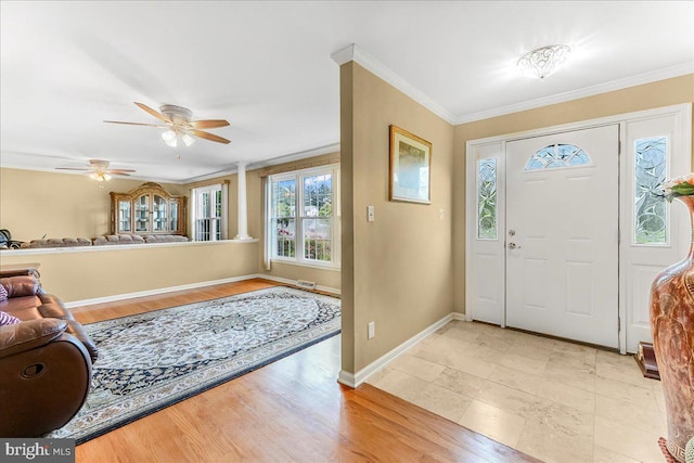 228 Benjamin Blvd, Bear, DE 19701 - entryway featuring ornamental molding, a ceiling fan, and light wood-type flooring