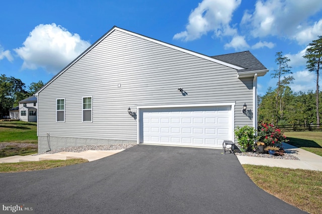 21 Walnut Grove Dr, Fredericksburg, VA 22406 - view of home's exterior featuring driveway and a garage