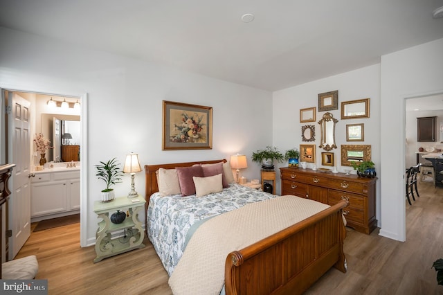 21 Walnut Grove Dr, Fredericksburg, VA 22406 - bedroom featuring light wood-style floors and ensuite bath