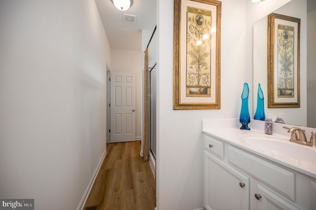 21 Walnut Grove Dr, Fredericksburg, VA 22406 - full bathroom featuring vanity, wood finished floors, and a stall shower