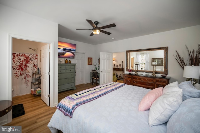 21 Walnut Grove Dr, Fredericksburg, VA 22406 - bedroom featuring light wood finished floors, a ceiling fan, and ensuite bath