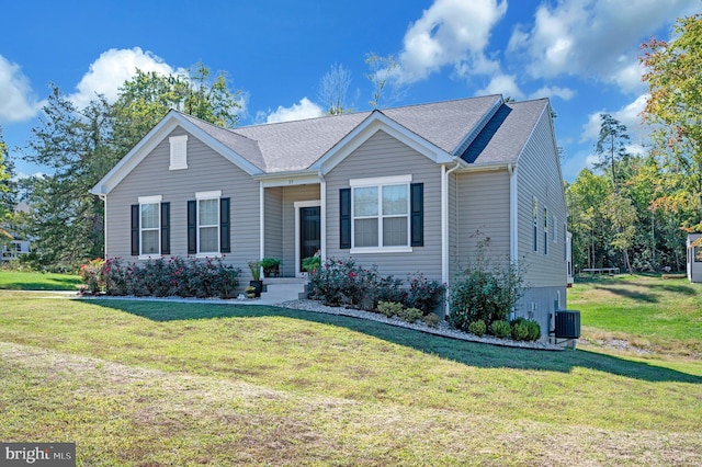 21 Walnut Grove Dr, Fredericksburg, VA 22406 - ranch-style house with a front yard and a shingled roof