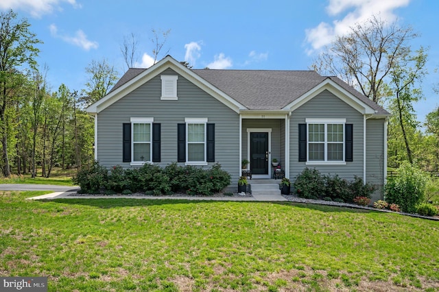 21 Walnut Grove Dr, Fredericksburg, VA 22406 - view of front of house featuring a front lawn and a shingled roof