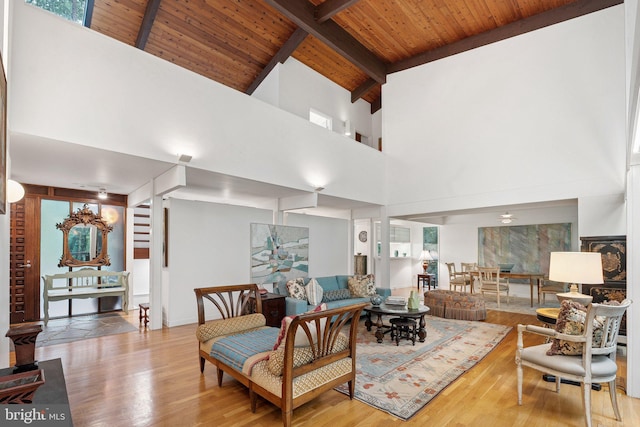 1330 Potomac School Rd, Mclean, VA 22101 - living room with high vaulted ceiling, wood finished floors, and a wooden ceiling with exposed beams