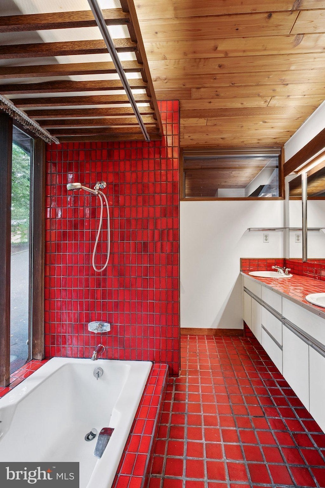 1330 Potomac School Rd, Mclean, VA 22101 - full bath with double vanity, tile patterned floors, and tiled shower / bath