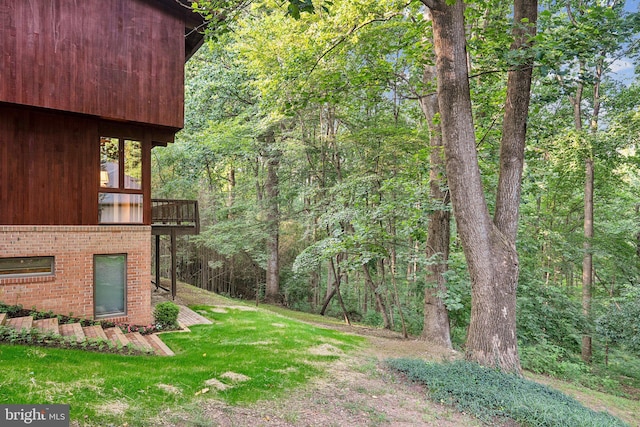 1330 Potomac School Rd, Mclean, VA 22101 - view of green lawn featuring a view of trees and a deck