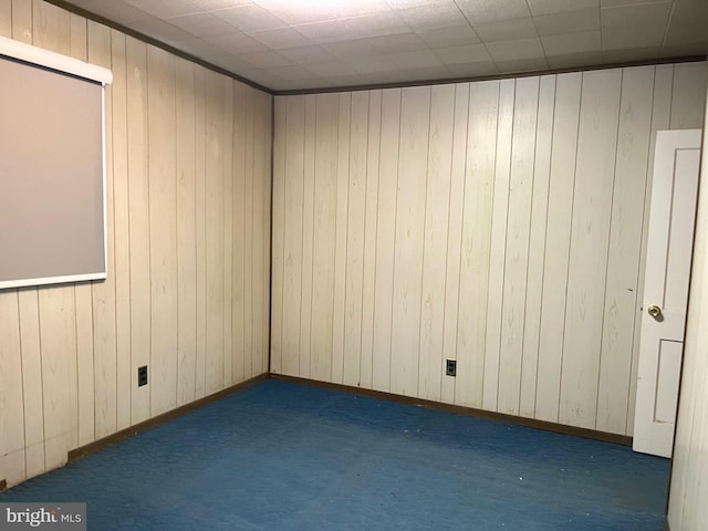 717 Garnet Rd, Wilmington, DE 19804 - empty room with carpet flooring and wooden walls