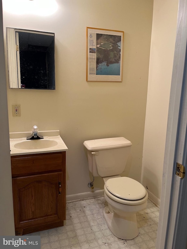 717 Garnet Rd, Wilmington, DE 19804 - half bathroom with vanity and tile patterned floors