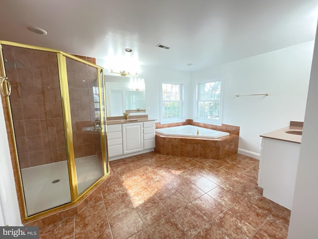 7212 Highland St, Springfield, VA 22150 - bathroom with vanity, a bath, a shower stall, and tile patterned floors