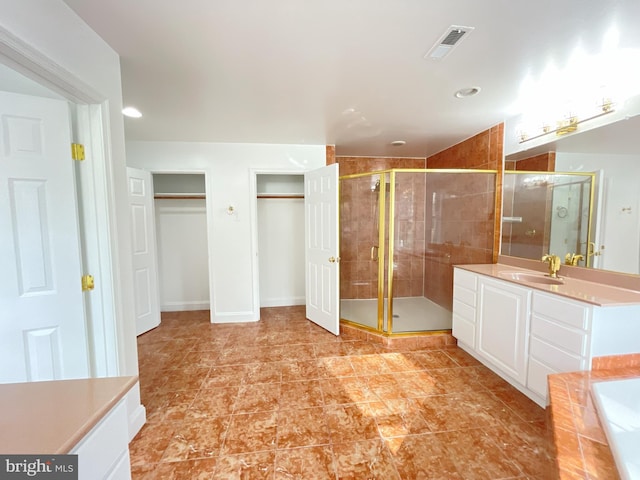 7212 Highland St, Springfield, VA 22150 - full bath featuring a shower stall, vanity, a bathtub, and recessed lighting