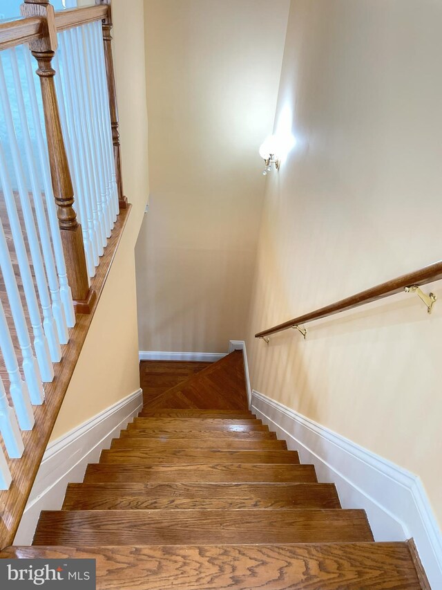 7212 Highland St, Springfield, VA 22150 - stairs featuring baseboards